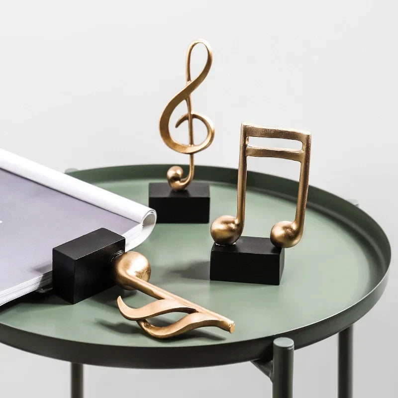 Ornamento Notas Musicais Douradas – Elegância e Harmonia na Sua Decoração 🎶✨ Canto Decor